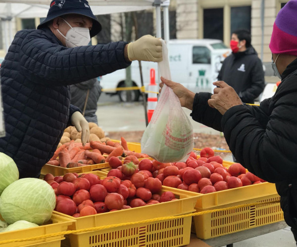 Buying winter vegetables at the farmers market