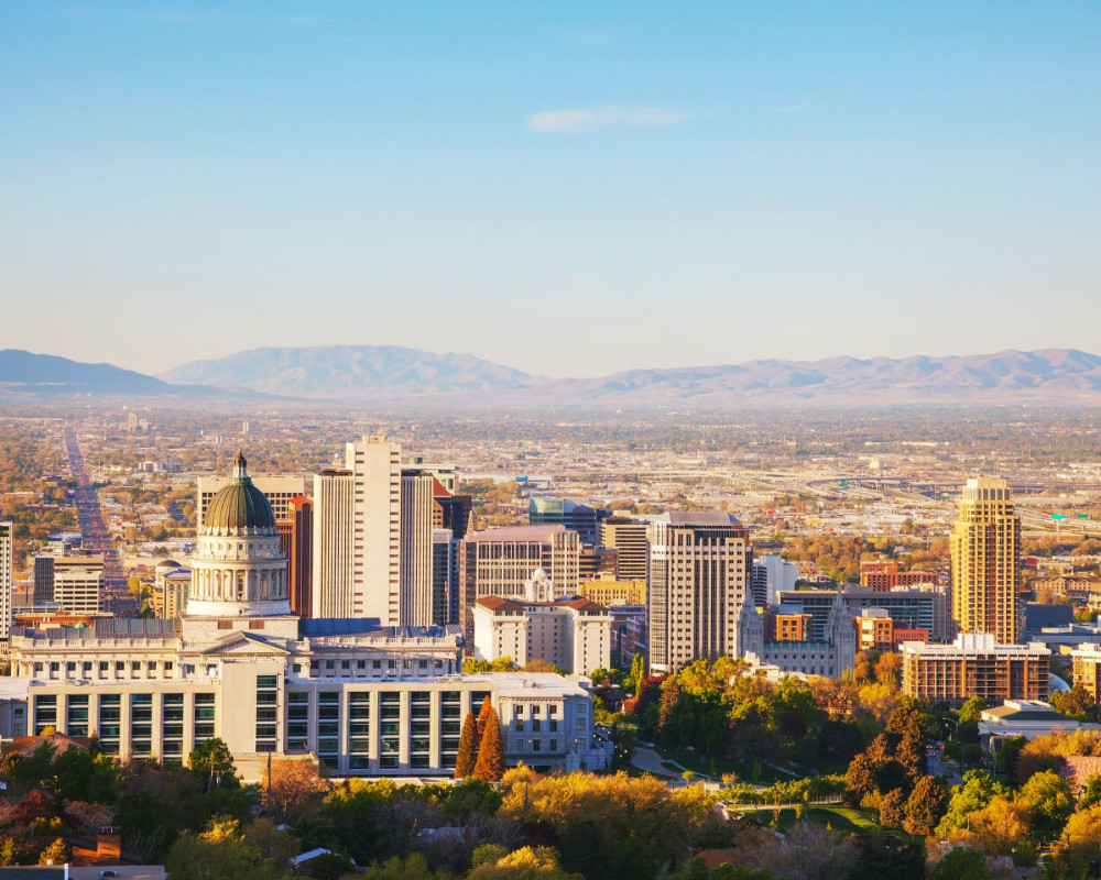 City skyline with mountains in the distance