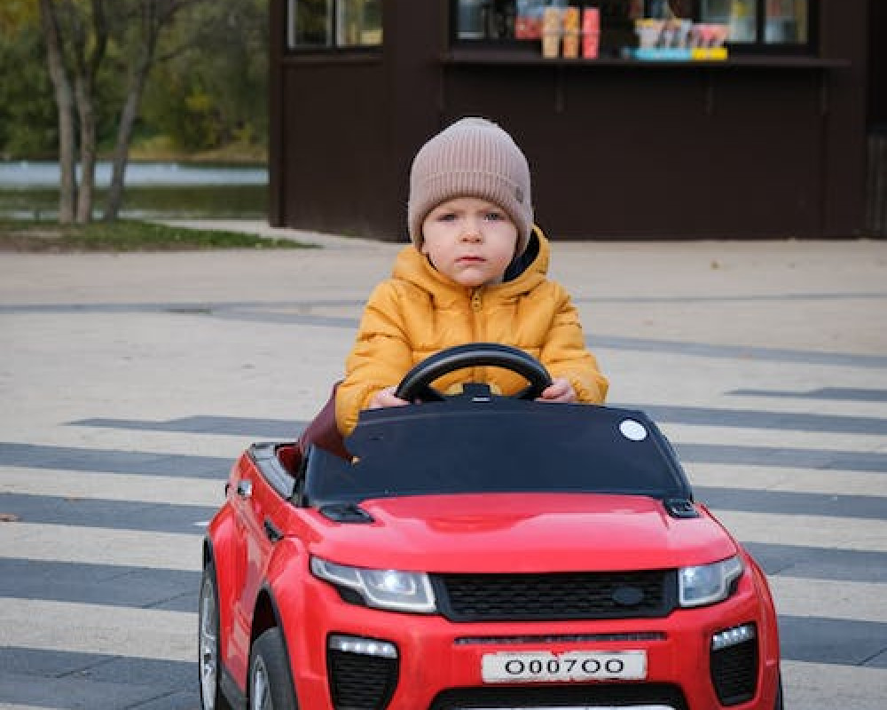 Baby with toy car